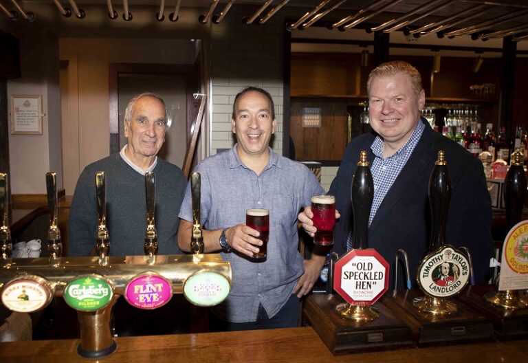 Greene King's Axe & Compasses pub reopens after fire